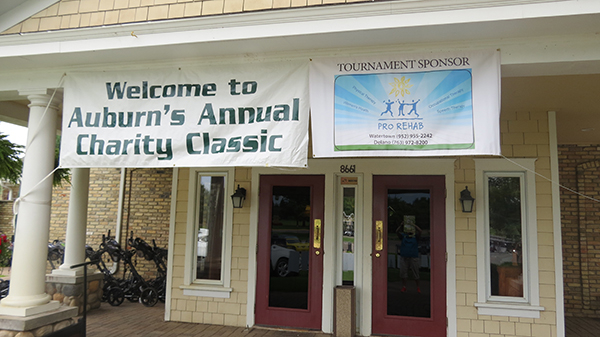 Tournament sponsor banner at Auburn Golf Tournament