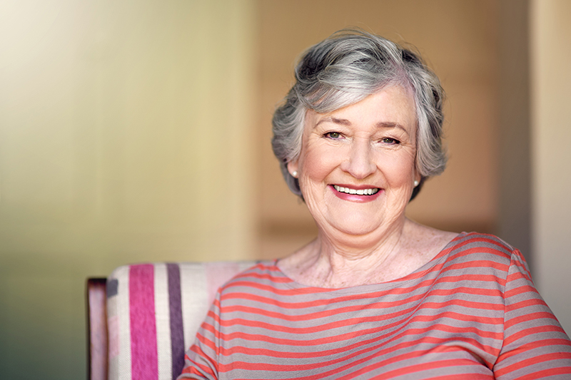 Talheim Apartments independent living resident smiling